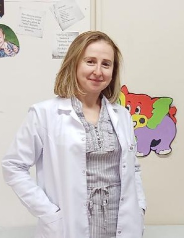 NEŞE MUTLU